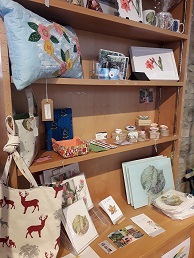 display of craft items including bags, ceramics and kitchenware